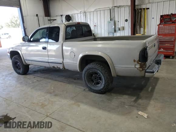 1999 Dodge Dakota SLT с VIN 1B7GG22Y1XS255974, выставлен на аукционе Copart как лот 69279844 с пробегом 107 100 миль миль и Чистый • Clean title. История ставок и продаж доступна на DreamBid. Изображение 2.