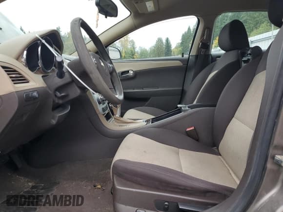 ✅ 2012 Chevrolet Malibu 1LS • VIN: 1G1ZB5E09CF150285 • Lot: 86843625. Listed on Copart with 129,115 mi. Free auction sales archive from the USA and detailed vehicle history report at DreamBid. Image 7.