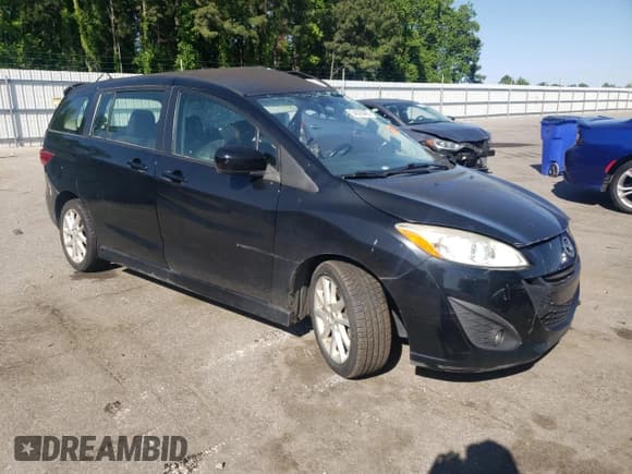 ✅ 2012 Mazda 5 Touring • VIN: JM1CW2CL9C0107789 • Lot: 54526465. Listed on Copart with 161,377 mi. Free auction sales archive from the USA and detailed vehicle history report at DreamBid. Image 4.
