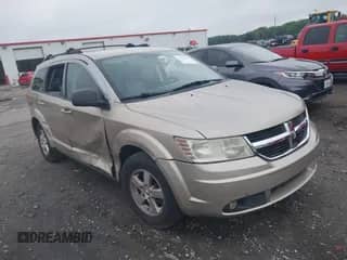 2009 Dodge Journey SE z VIN 3D4GG47B09T208939, wystawiony jako IAAI lot #42707587 z przebiegiem 117 704 mil mil oraz . Historia ofert i sprzedaży dostępna na DreamBid. Obrazek 1.