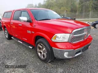 ✅ 2016 Ram 1500 Laramie • VIN: 1C6RR7VT8GS151571 • Lot: 43373576. Listed on IAAI with 165,454 mi. Free auction sales archive from the USA and detailed vehicle history report at DreamBid. Image 1.