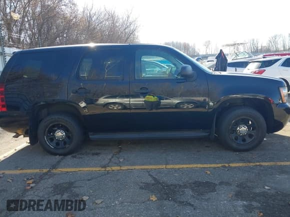 ✅ 2014 Chevrolet Tahoe Commercial • VIN: 1GNLC2E0XER158929 • Lot: 43623990. Wystawiony na IAAI z przebiegiem 150 104 mil. Bezpłatny archiwum sprzedaży aukcyjnych z USA i szczegółowy raport historii pojazdu na DreamBid. Zdjęcie 13.