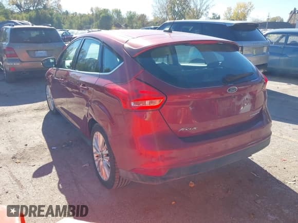 ✅ 2017 Ford Focus Titanium • VIN: 1FADP3N2XHL264867 • Lot: 43615673. Listed on IAAI with 112,259 mi. Free auction sales archive from the USA and detailed vehicle history report at DreamBid. Image 3.