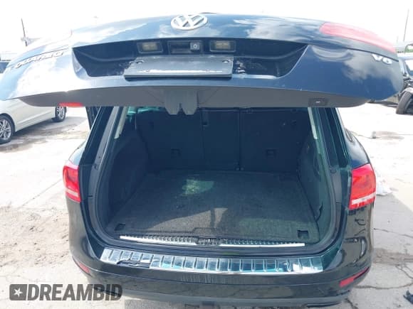 ✅ 2011 Volkswagen Touareg Sport • VIN: WVGFF9BP7BD000799 • Лот: 42178489. Опубликован ранее на IAAI с пробегом 217 658 миль. Бесплатный доступ к архиву аукционных продаж из США и подробный отчёт об истории автомобиля на DreamBid. Изображение 13.