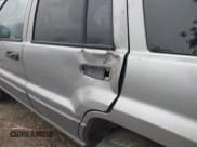 ✅ 2002 Jeep Grand Cherokee • VIN: 1J8GX48S42C147018 • Lot: 43589496. Listed on IAAI with 192,014 mi. Free auction sales archive from the USA and detailed vehicle history report at DreamBid. Image 6.