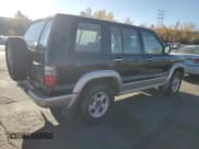 ✅ 2001 Isuzu Trooper S • VIN: JACDJ58X217J01836 • Lot: 77548874. Listed on Copart with Not provided. Free auction sales archive from the USA and detailed vehicle history report at DreamBid. Image 3.