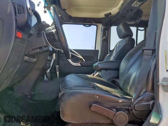 ✅ 2014 Jeep Wrangler Unlimited Rubicon X • VIN: 1C4BJWFG5EL207101 • Lot: 85734995. Listed on Copart with 147,511 mi. Free auction sales archive from the USA and detailed vehicle history report at DreamBid. Image 7.