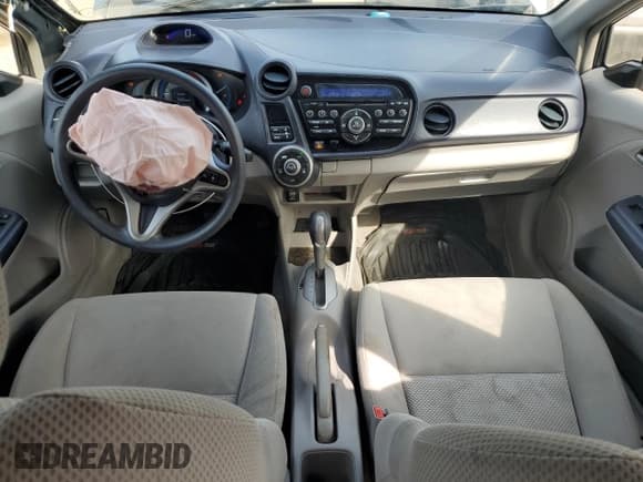 ✅ 2010 Honda Insight LX • VIN: JHMZE2H52AS019478 • Лот: 67657704. Опубликован ранее на Copart с пробегом 186 688 миль. Бесплатный доступ к архиву аукционных продаж из США и подробный отчёт об истории автомобиля на DreamBid. Изображение 8.