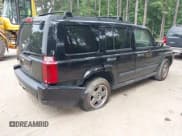 ✅ 2006 Jeep Commander • VIN: 1J8HH48N56C126051 • Lot: 42711962. Listed on IAAI with 210,509 mi. Free auction sales archive from the USA and detailed vehicle history report at DreamBid. Image 4.