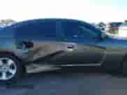 2014 Dodge Charger SE with VIN 2C3CDXBG6EH300282, listed as a IAAI auction lot 43465010 with 76,227 mi miles and . Bid and sale history available at DreamBid. Image 13.