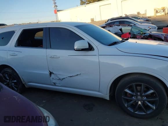 ✅ 2014 Dodge Durango R/T • VIN: 1C4SDHCT3EC596678 • Lot: 41887839. Listed on IAAI with 164,050 mi. Free auction sales archive from the USA and detailed vehicle history report at DreamBid. Image 13.