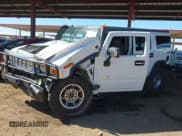 ✅ 2003 Hummer H2 • VIN: 5GRGN23U33H115738 • Lot: 42234560. Listed on IAAI with Not provided. Free auction sales archive from the USA and detailed vehicle history report at DreamBid. Image 2.