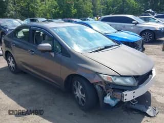 ✅ 2014 Honda Civic • VIN: 19XFB4F2XEE200659 • Lot: 42760221. Listed on IAAI with 1,051,640 mi. Free auction sales archive from the USA and detailed vehicle history report at DreamBid. Image 1.
