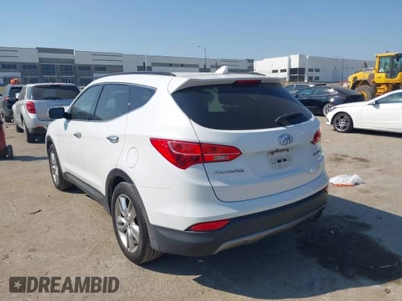 2014 Hyundai Santa Fe with VIN 5XYZU3LA7EG183450, listed as a IAAI auction lot 43218232 with 102,132 mi miles and . Bid and sale history available at DreamBid. Image 3.
