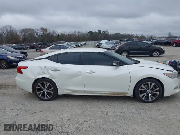 ✅ 2016 Nissan Maxima SL • VIN: 1N4AA6AP2GC423595 • Lot: 41490962. Wystawiony na IAAI z przebiegiem 192 727 mil. Bezpłatny archiwum sprzedaży aukcyjnych z USA i szczegółowy raport historii pojazdu na DreamBid. Zdjęcie 13.