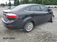 ✅ 2015 Ford Fiesta Titanium • VIN: 3FADP4CJ4FM198201 • Lot: 61480925. Wystawiony na Copart z przebiegiem 143 890 mil. Bezpłatny archiwum sprzedaży aukcyjnych z USA i szczegółowy raport historii pojazdu na DreamBid. Zdjęcie 3.