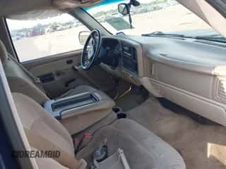 2002 Chevrolet Suburban LT z VIN 1GNEC16Z22J299794, wystawiony jako IAAI lot #42888483 z przebiegiem 189 339 mil mil oraz . Historia ofert i sprzedaży dostępna na DreamBid. Obrazek 5.