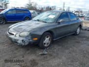 ✅ 1996 Ford Taurus GL • VIN: 1FALP52U9TA199317 • Lot: 43694961. Wystawiony na IAAI z przebiegiem 99 130 mil. Bezpłatny archiwum sprzedaży aukcyjnych z USA i szczegółowy raport historii pojazdu na DreamBid. Zdjęcie 2.