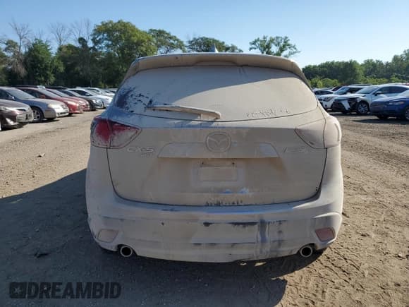 ✅ 2014 Mazda CX-5 Grand Touring • VIN: JM3KE4DY1E0426327 • Лот: 70492415. Опубликован ранее на Copart с пробегом 177 180 миль. Бесплатный доступ к архиву аукционных продаж из США и подробный отчёт об истории автомобиля на DreamBid. Изображение 6.