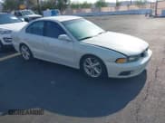 ✅ 2002 Mitsubishi Galant ES • VIN: 4A3AA46GX2E116385 • Lot: 42750895. Listed on IAAI with 163,723 mi. Free auction sales archive from the USA and detailed vehicle history report at DreamBid. Image 1.