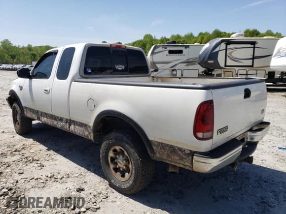 ✅ 1998 Ford F-250 • VIN: 1FTPX28L5WNA87328 • Lot: 53702875. Listed on Copart with 307,363 mi. Free auction sales archive from the USA and detailed vehicle history report at DreamBid. Image 2.