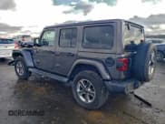 ✅ 2018 Jeep Wrangler Unlimited Sahara • VIN: 1C4HJXEG0JW322926 • Lot: 94485715. Listed on Copart with 76,414 mi. Free auction sales archive from the USA and detailed vehicle history report at DreamBid. Image 2.