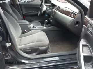 2015 Chevrolet Impala LT z VIN 2G1WB5E3XF1115439, wystawiony jako IAAI lot #43414645 z przebiegiem 220 302 mil mil oraz . Historia ofert i sprzedaży dostępna na DreamBid. Obrazek 5.