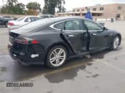 ✅ 2015 Tesla Model S 85 • VIN: 5YJSA1E16FF107254 • Lot: 43741109. Listed on IAAI with 119,933 mi. Free auction sales archive from the USA and detailed vehicle history report at DreamBid. Image 4.