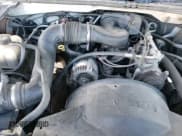 ✅ 2003 Chevrolet Silverado 1500 • VIN: IDCO004199ZZ • Лот: 85870734. Опубликован ранее на Copart с пробегом 289 533 миль. Бесплатный доступ к архиву аукционных продаж из США и подробный отчёт об истории автомобиля на DreamBid. Изображение 13.