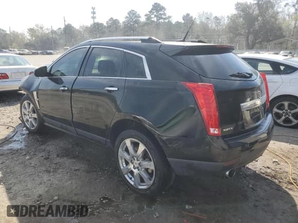 ✅ 2012 Cadillac SRX Performance Collection • VIN: 3GYFNBE31CS509239 • Lot: 47958424. Listed on Copart with 171,067 mi. Free auction sales archive from the USA and detailed vehicle history report at DreamBid. Image 2.