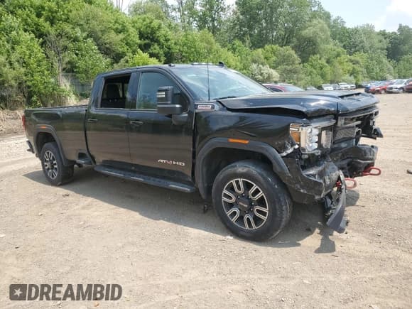✅ 2023 GMC Sierra 3500HD AT4 • VIN: 1GT49VEY6PF150690 • Лот: 59717005. Опубликован ранее на Copart с пробегом 50 759 миль. Бесплатный доступ к архиву аукционных продаж из США и подробный отчёт об истории автомобиля на DreamBid. Изображение 4.