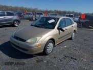 ✅ 2002 Ford Focus LX • VIN: 1FAFP33P42W289681 • Lot: 41989506. Wystawiony na IAAI z przebiegiem 128 070 mil. Bezpłatny archiwum sprzedaży aukcyjnych z USA i szczegółowy raport historii pojazdu na DreamBid. Zdjęcie 2.