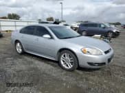 ✅ 2014 Chevrolet Impala LTZ • VIN: 2G1WC5E38E1147222 • Lot: 82001215. Listed on Copart with 160,275 mi. Free auction sales archive from the USA and detailed vehicle history report at DreamBid. Image 4.