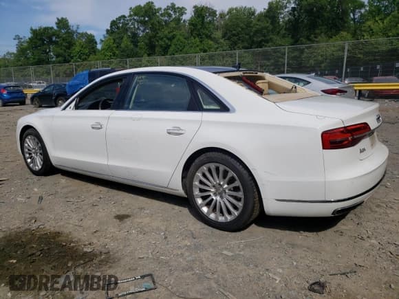 ✅ 2015 Audi A8 3.0T • VIN: WAU3GAFD1FN023983 • Лот: 57911883. Опубликован ранее на Copart с пробегом 138 869 миль. Бесплатный доступ к архиву аукционных продаж из США и подробный отчёт об истории автомобиля на DreamBid. Изображение 2.