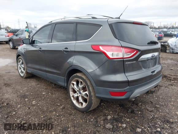 ✅ 2015 Ford Escape Titanium • VIN: 1FMCU0J94FUB00176 • Lot: 43802892. Listed on IAAI with 168,065 mi. Free auction sales archive from the USA and detailed vehicle history report at DreamBid. Image 3.
