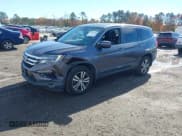 ✅ 2018 Honda Pilot EX-L • VIN: 5FNYF6H57JB028742 • Lot: 43575850. Listed on IAAI with 170,260 mi. Free auction sales archive from the USA and detailed vehicle history report at DreamBid. Image 17.