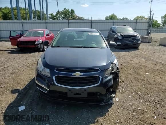 ✅ 2015 Chevrolet Cruze LS • VIN: 1G1PA5SHXF7288856 • Lot: 80012745. Listed on Copart with 103,149 mi. Free auction sales archive from the USA and detailed vehicle history report at DreamBid. Image 13.