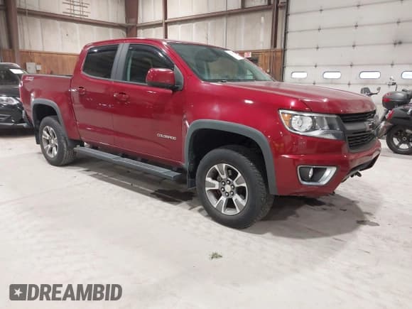 ✅ 2018 Chevrolet Colorado 4WD Z71 • VIN: 1GCGTDEN4J1185490 • Лот: 43420567. Опубликован ранее на IAAI с пробегом 80 532 миль. Бесплатный доступ к архиву аукционных продаж из США и подробный отчёт об истории автомобиля на DreamBid. Изображение 1.