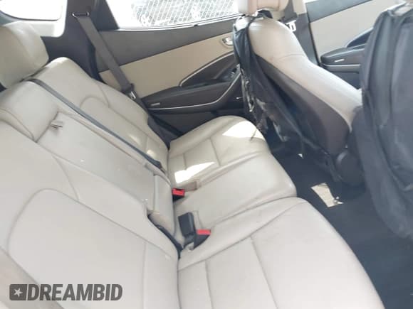 ✅ 2014 Hyundai Santa Fe • VIN: 5XYZUDLB1EG227778 • Lot: 43033757. Listed on IAAI with 135,496 mi. Free auction sales archive from the USA and detailed vehicle history report at DreamBid. Image 8.