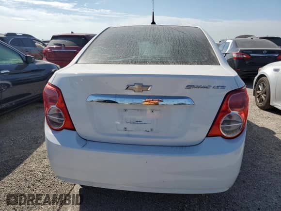 2012 Chevrolet Sonic LTZ with VIN 1G1JE5SH2C4157346, listed as a Copart auction lot 75705184 with Not provided miles and Salvage title. Bid and sale history available at DreamBid. Image 6.