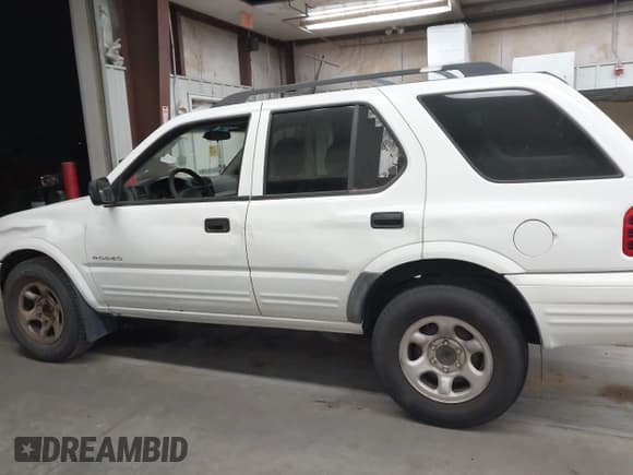 ✅ 2004 Isuzu Rodeo S • VIN: 4S2CK58W244301482 • Lot: 43614335. Wystawiony na IAAI z przebiegiem 163 277 mil. Bezpłatny archiwum sprzedaży aukcyjnych z USA i szczegółowy raport historii pojazdu na DreamBid. Zdjęcie 14.