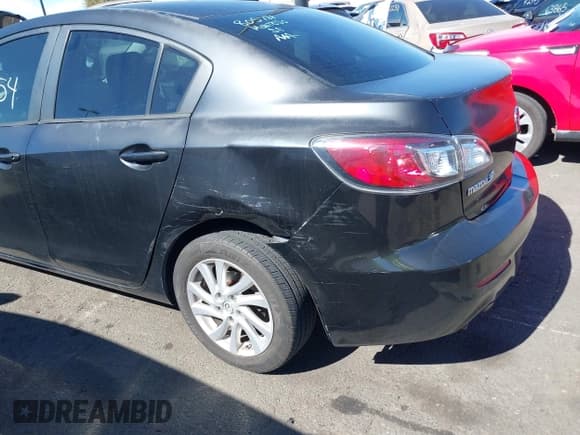 ✅ 2012 Mazda 3 i Touring • VIN: JM1BL1VG5C1506157 • Lot: 41629654. Listed on IAAI with 144,475 mi. Free auction sales archive from the USA and detailed vehicle history report at DreamBid. Image 6.