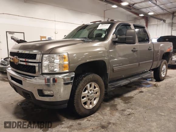 ✅ 2014 Chevrolet Silverado 2500HD LT • VIN: 1GC1KXC85EF131664 • Lot: 40820826. Listed on IAAI with 113,817 mi. Free auction sales archive from the USA and detailed vehicle history report at DreamBid. Image 2.