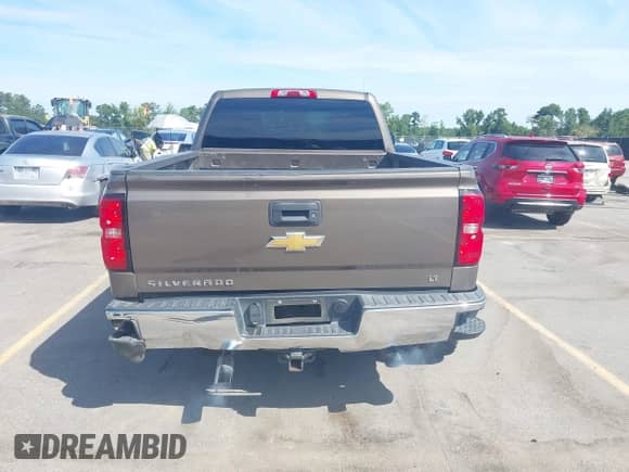 2015 Chevrolet Silverado 1500 LT z VIN 1GCVKREC6FZ161108, wystawiony jako IAAI lot #43074690 z przebiegiem 198 960 mil mil oraz . Historia ofert i sprzedaży dostępna na DreamBid. Obrazek 16.