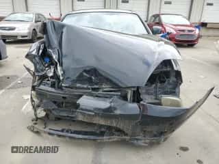 2006 Hyundai Tiburon GT z VIN KMHHN65F66U215304, wystawiony jako Copart lot #56141635 z przebiegiem 149 118 mil mil oraz Szkoda całkowita • Salvage title. Historia ofert i sprzedaży dostępna na DreamBid. Obrazek 5.