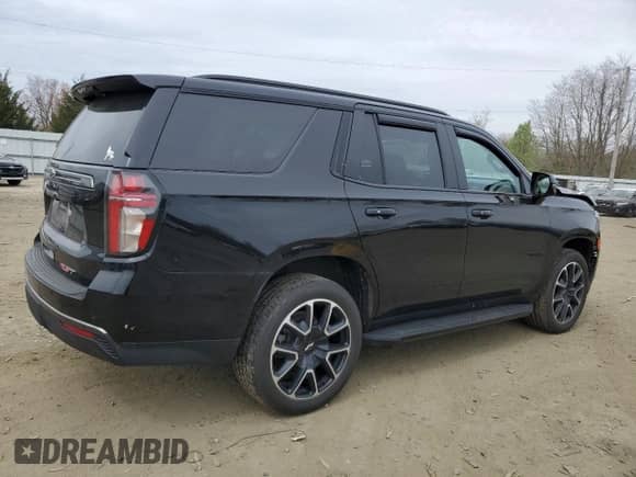 2022 Chevrolet Tahoe RST with VIN 1GNSKRKDXNR134502, listed as a Copart auction lot 50757764 with 25,434 mi miles and Salvage title. Bid and sale history available at DreamBid. Image 3.