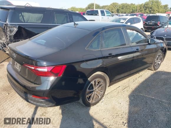 ✅ 2023 Volkswagen Jetta Sport • VIN: 3VWAM7BU5PM052116 • Lot: 43210653. Listed on IAAI with 27,675 mi. Free auction sales archive from the USA and detailed vehicle history report at DreamBid. Image 4.