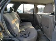 ✅ 1999 Isuzu Rodeo S • VIN: 4S2CK58W3X4362974 • Lot: 43155155. Listed on Copart with 396,448 mi. Free auction sales archive from the USA and detailed vehicle history report at DreamBid. Image 12.