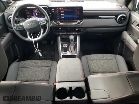 ✅ 2024 Chevrolet Colorado 4WD Z71 • VIN: 1GCPTDEK0R1296409 • Лот: 84957595. Опубликован ранее на Copart с пробегом 10 446 миль. Бесплатный доступ к архиву аукционных продаж из США и подробный отчёт об истории автомобиля на DreamBid. Изображение 8.