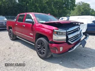 ✅ 2018 Chevrolet Silverado 1500 High Country • VIN: 3GCUKTEJ2JG170677 • Лот: 42893602. Опубликован ранее на IAAI с пробегом 84 565 миль. Бесплатный доступ к архиву аукционных продаж из США и подробный отчёт об истории автомобиля на DreamBid. Изображение 1.